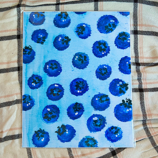 Print with blueberry pattern on a checkered fabric background