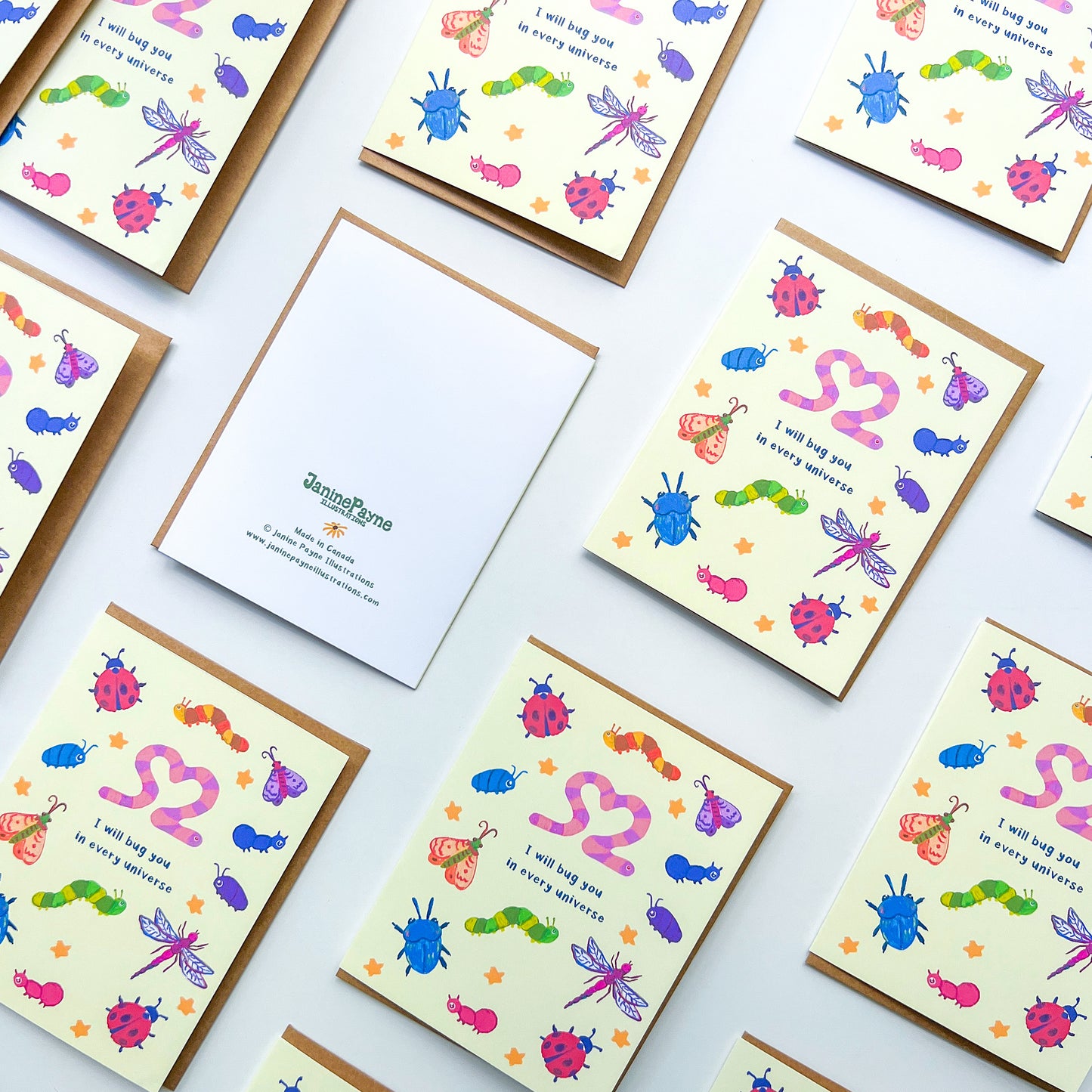 pattern of greeting cards with an illustration of various bugs and text 'I will bug you in every universe' on white background
