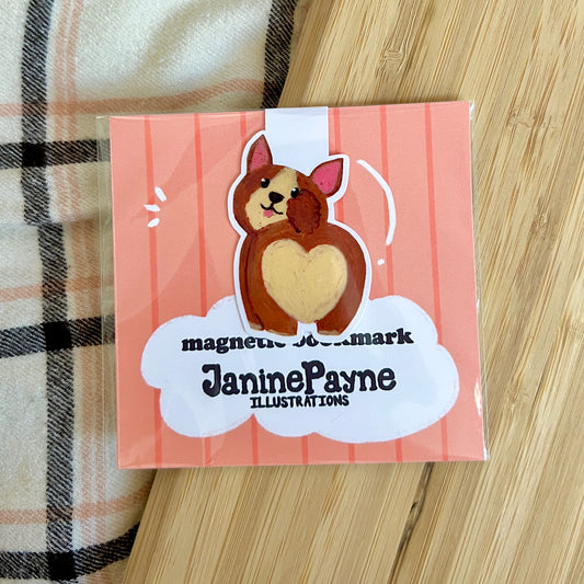 Magnetic bookmark with dog illustration on a striped background