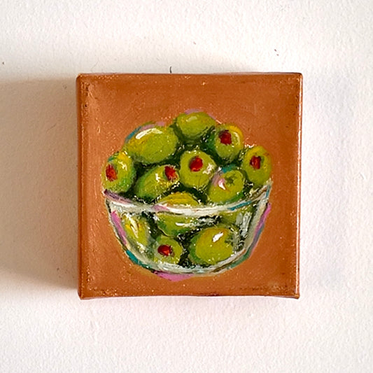 Painting of a glass bowl with green olives on a brown background