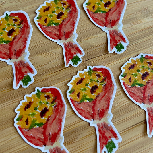 Stickers of flowers patterned on a wooden surface
