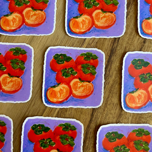 Pattern of persimmons on a wooden surface