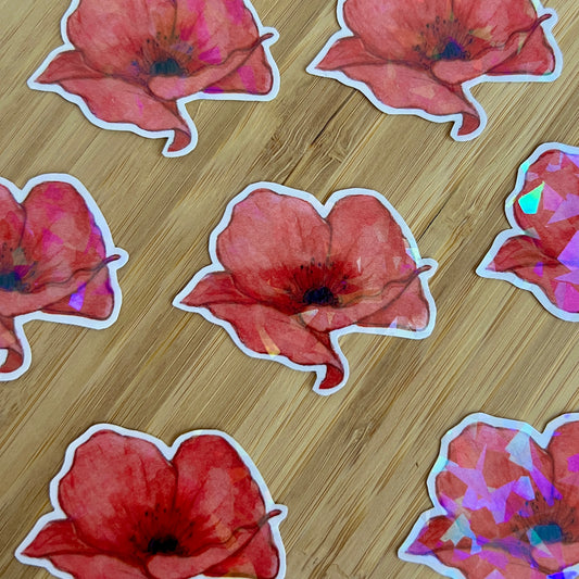 Floral stickers on a wooden surface