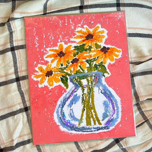 Painting of a vase with flowers on a textured red background, placed on a checkered fabric surface.