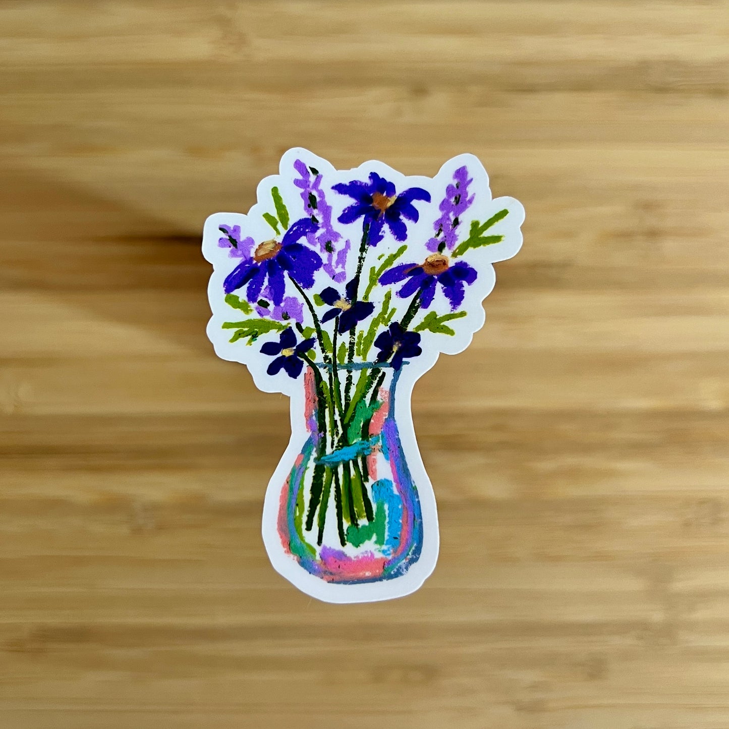 Sticker of a vase with purple flowers on a wooden surface