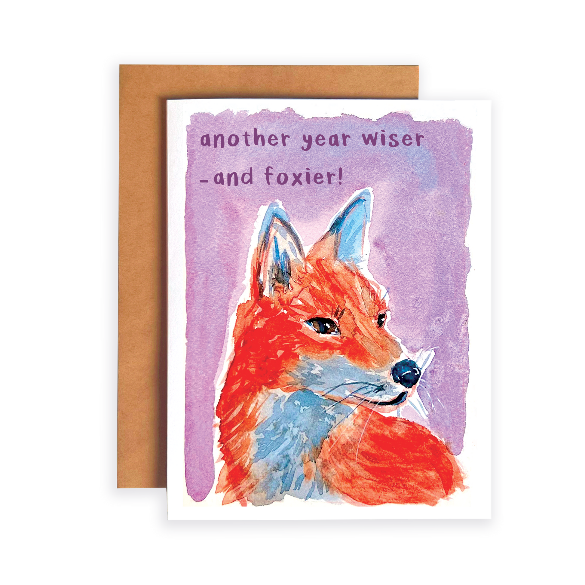 Greeting card with a fox illustration and text 'another year wiser and foxier!' on a purple background.