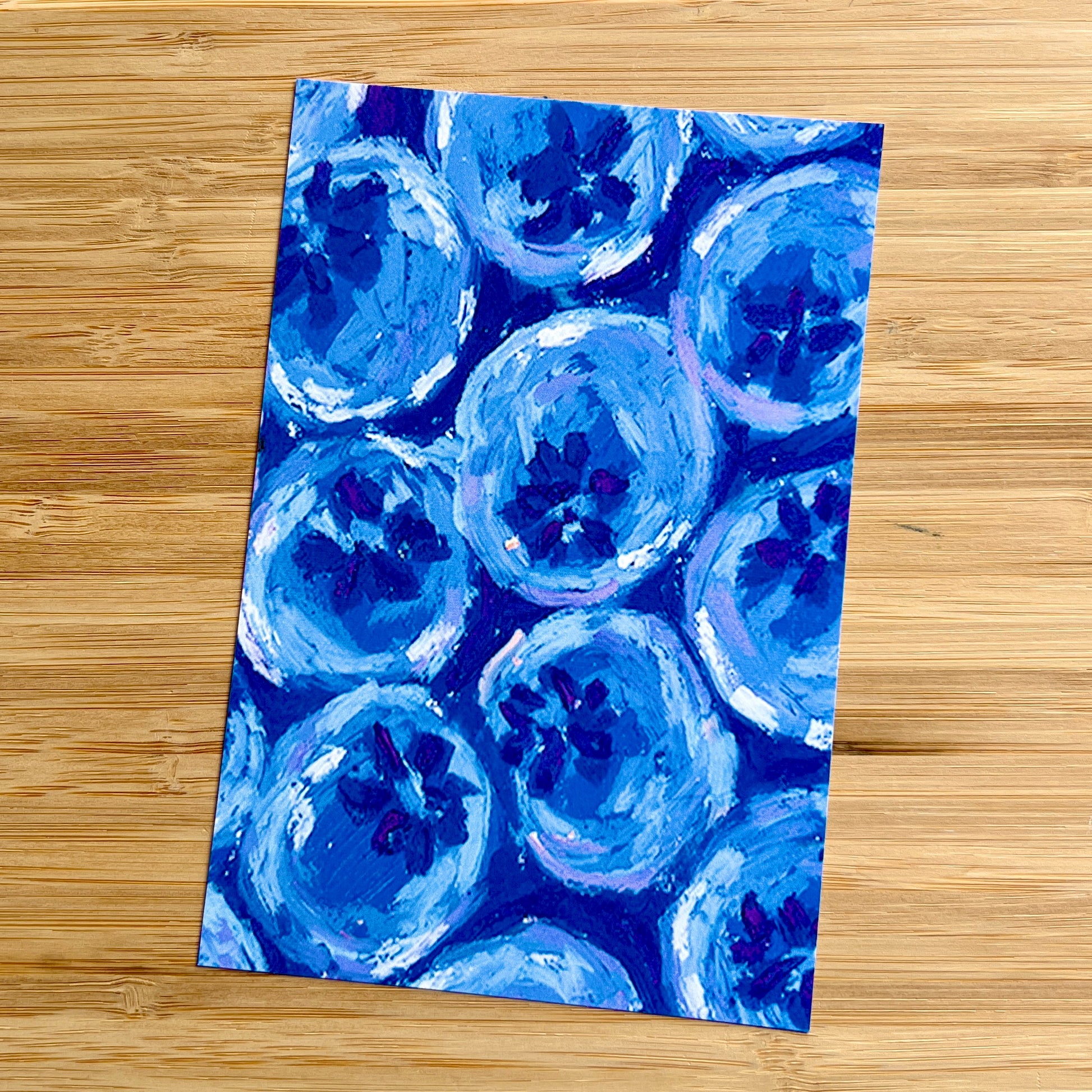 illustrated blueberries on a wooden surface