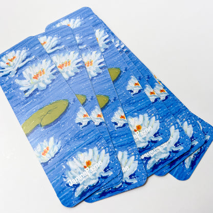 Set of bookmarks with white flowers and green leaves on a white background