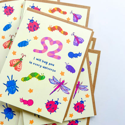 greeting card with an illustration of various bugs and text 'I will bug you in every universe' on white background