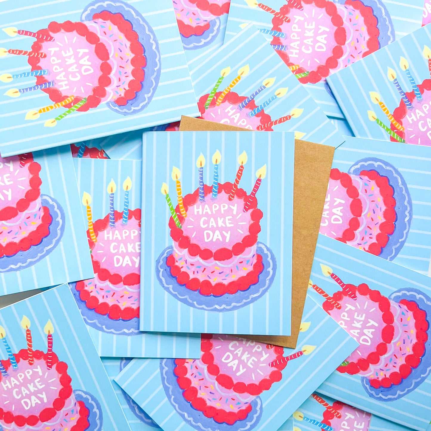 array of birthday cards with cake illustration and text 'happy cake day'