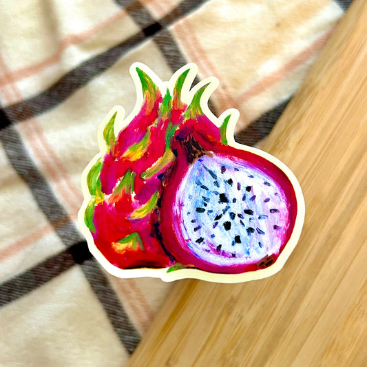 Colorful dragon fruit illustration on a checkered fabric background