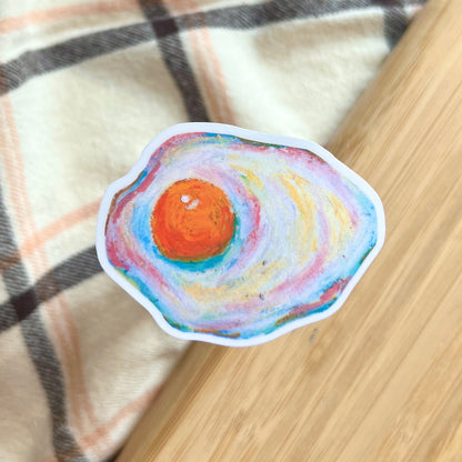 egg sticker on plaid and wooden background