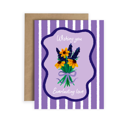 Greeting card with floral design and 'Wishing you Everlasting love' text on a purple striped background.
