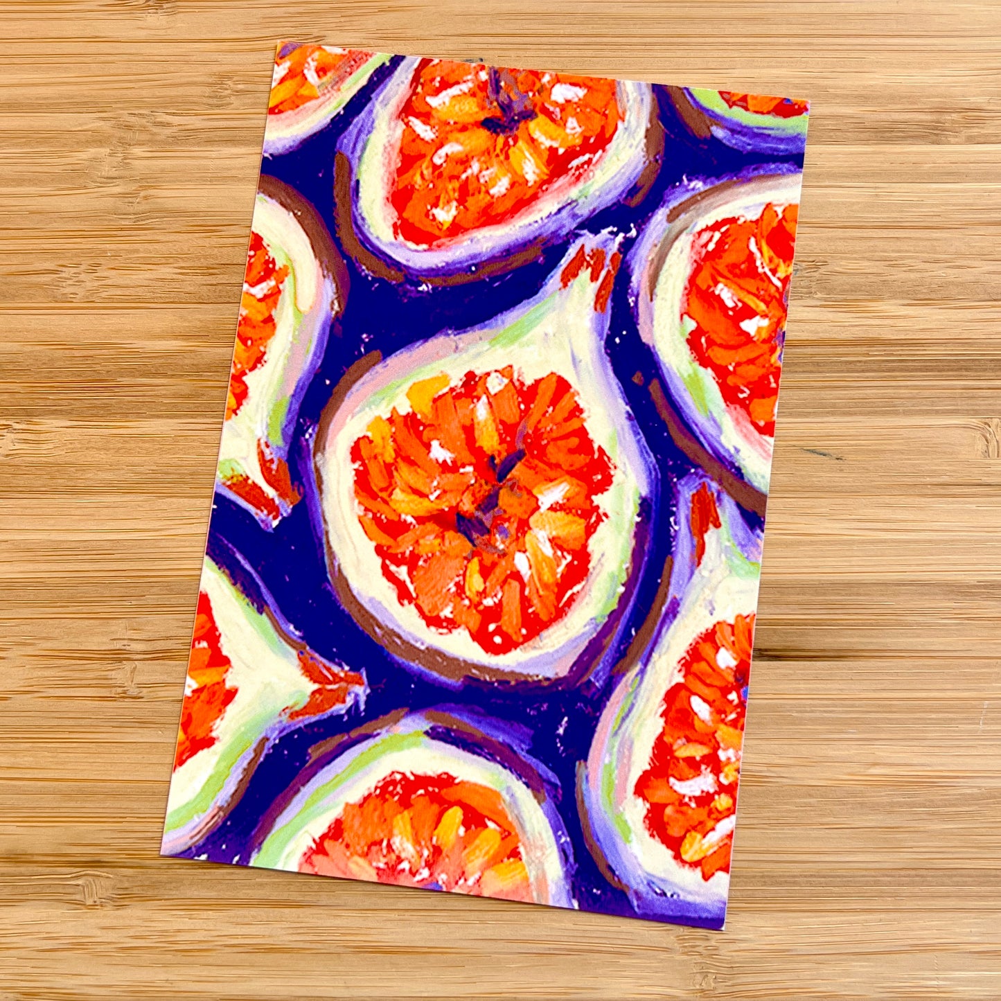 illustrated pattern of figs on a wooden surface