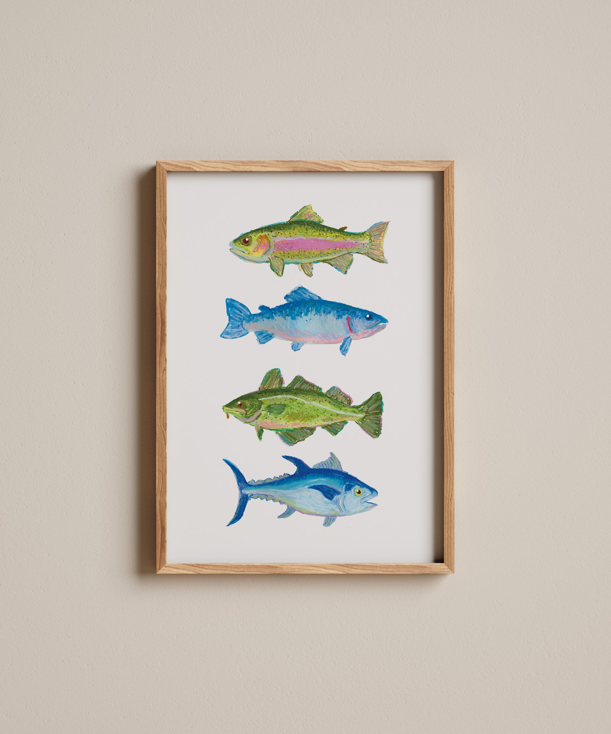 Framed artwork of four fish illustrations on a beige wall