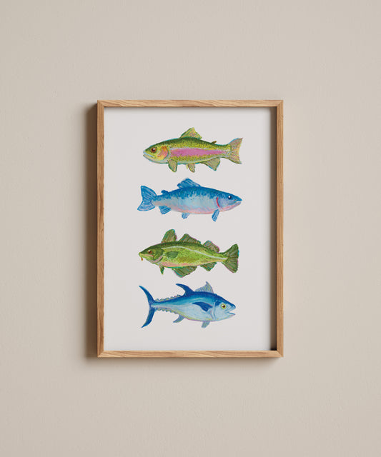 Framed artwork of four fish illustrations on a beige wall