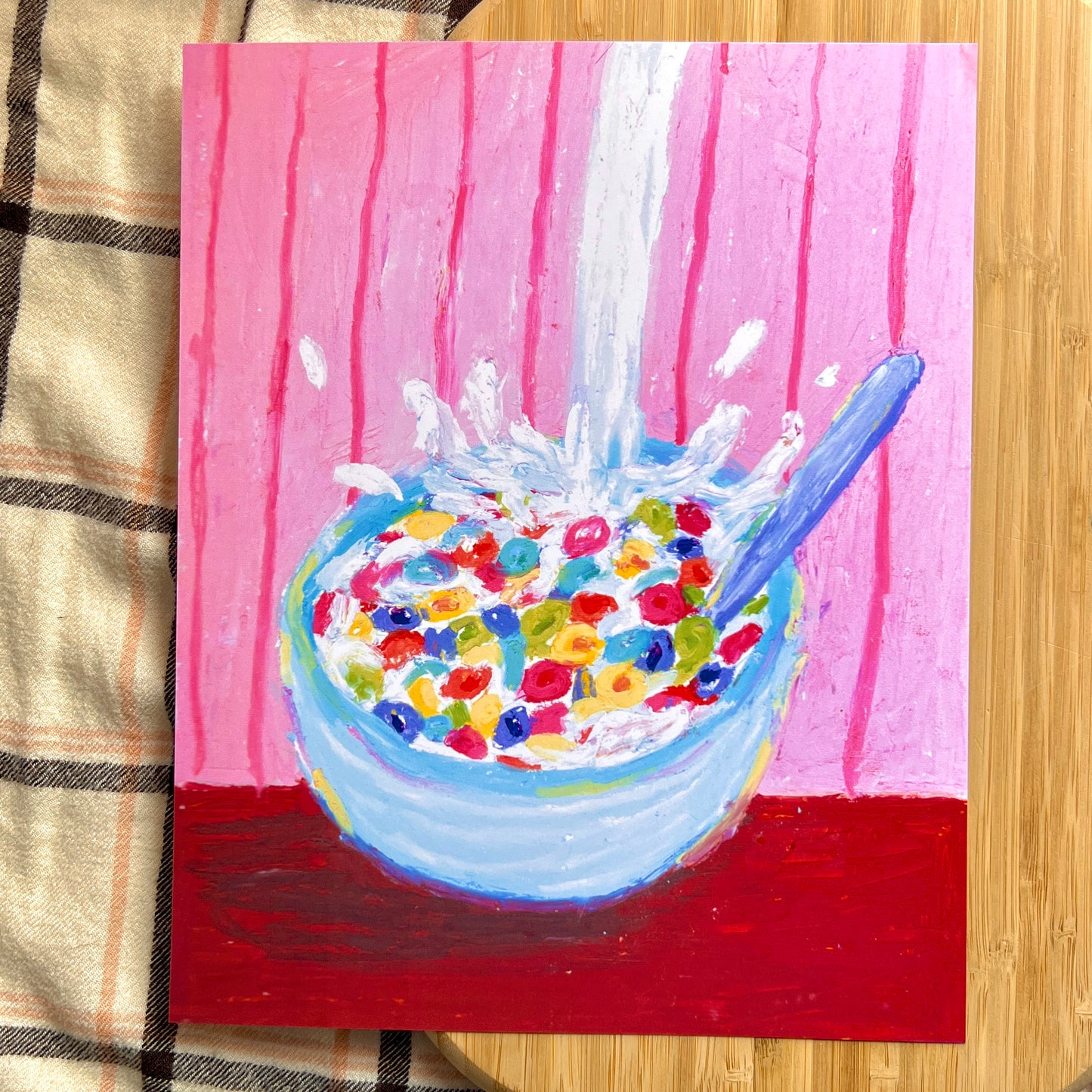 Painting of a bowl of cereal with colorful cereal pieces and a pink background.