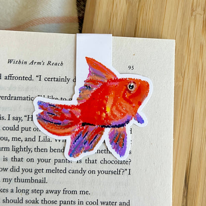 Colorful fish sticker on a book page