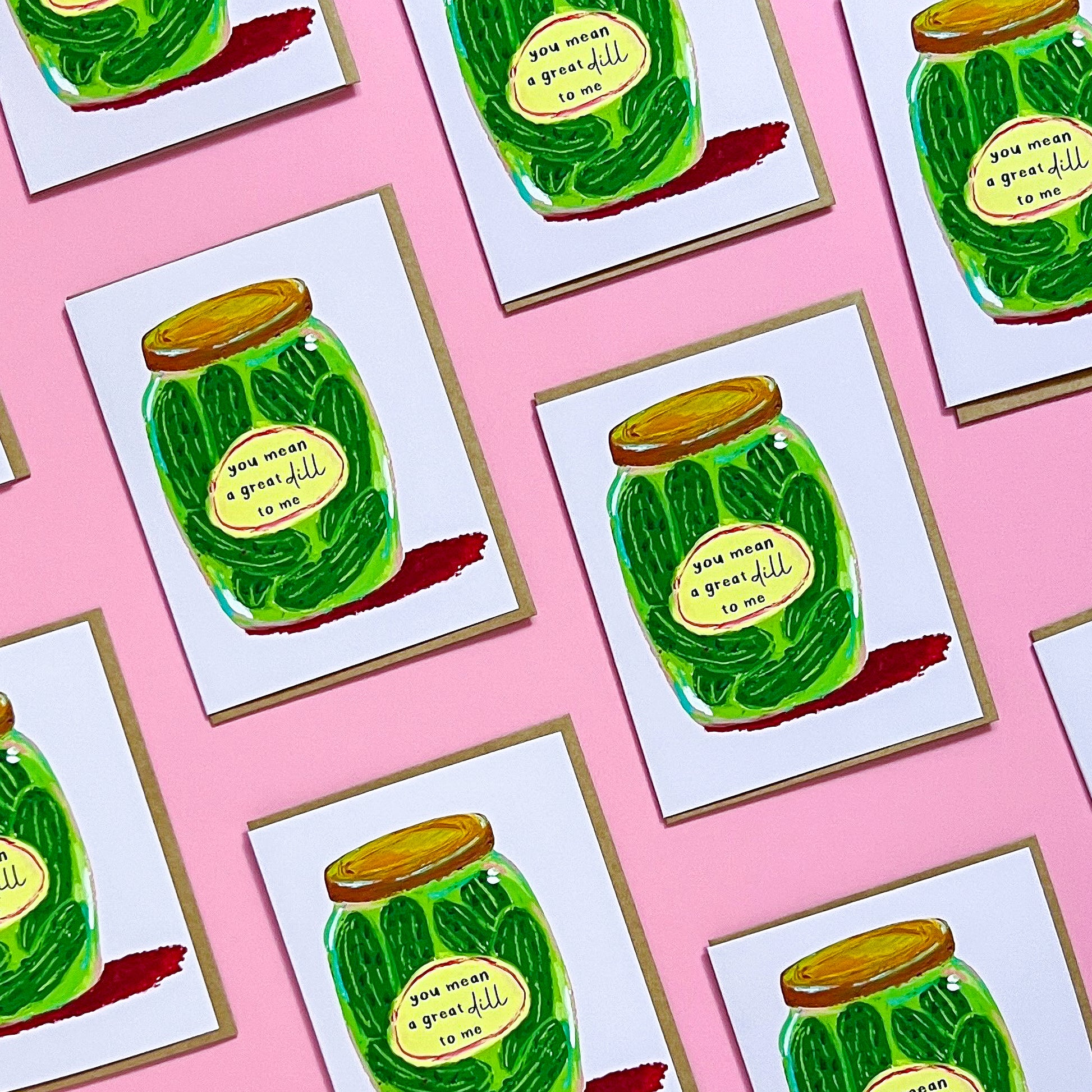 Multiple cards with pickle jar illustrations and humorous text on a pink background