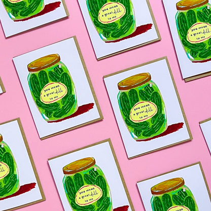 Multiple cards with pickle jar illustrations and humorous text on a pink background