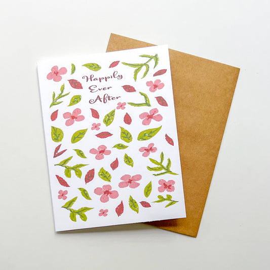 greeting card with floral pattern and text 'happily ever after'