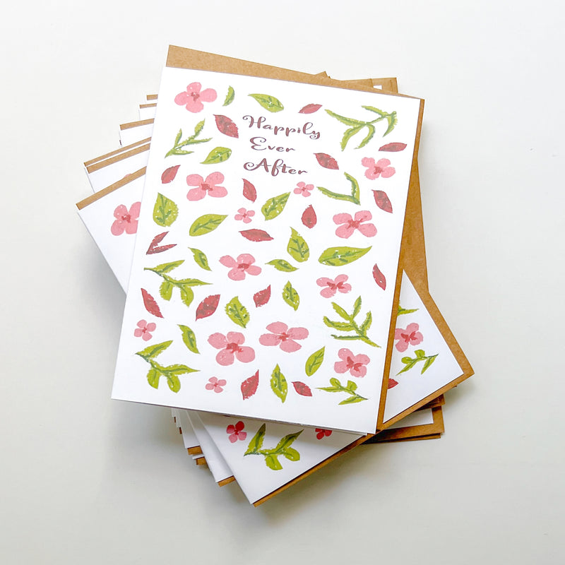 greeting cards with floral pattern and text 'happily ever after'