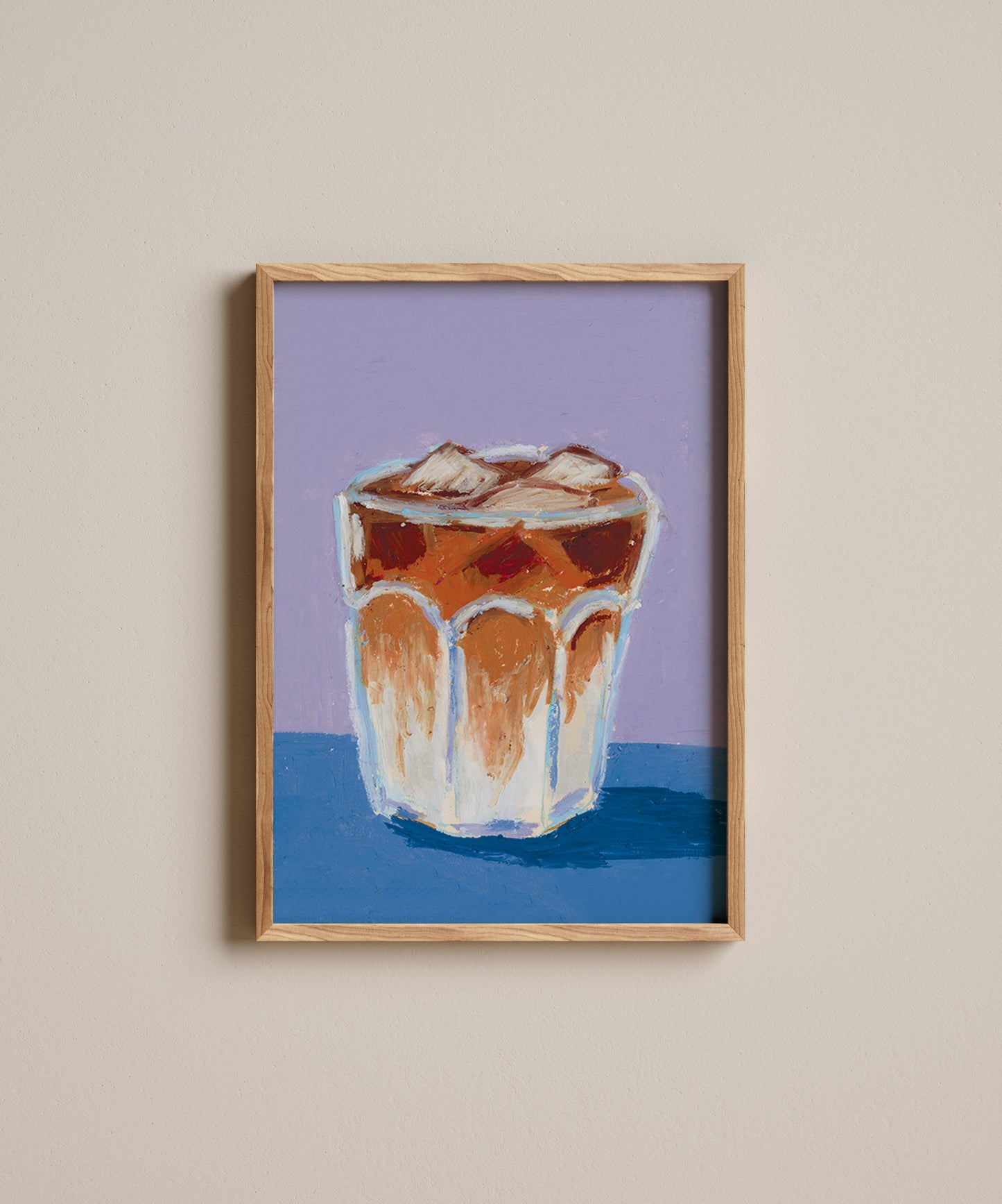 Framed artwork of a glass with a drink on a purple and blue background