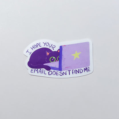 Sticker with a purple cat and text on a light gray background