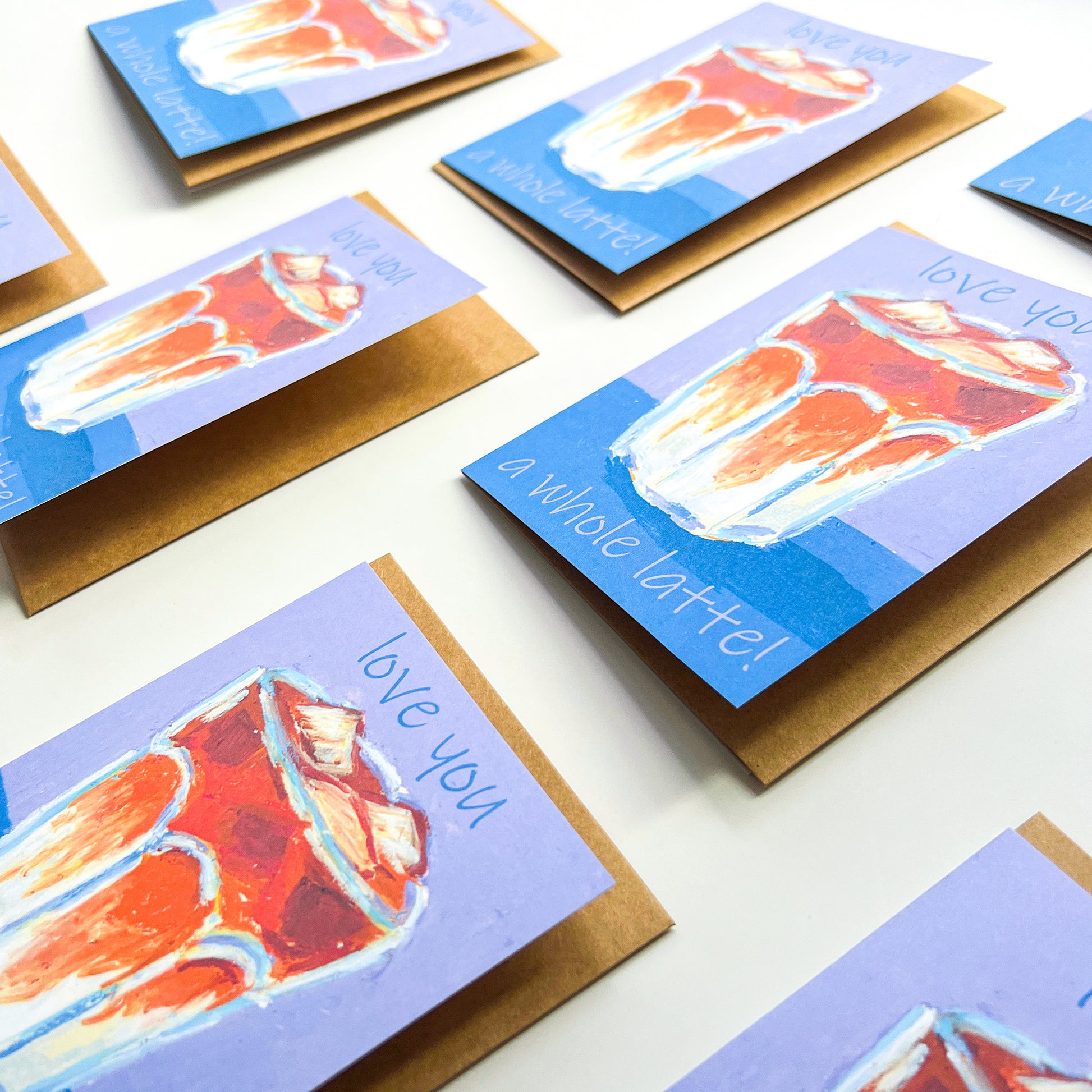 Greeting cards with a coffee cup illustration and 'love you' text on a white background