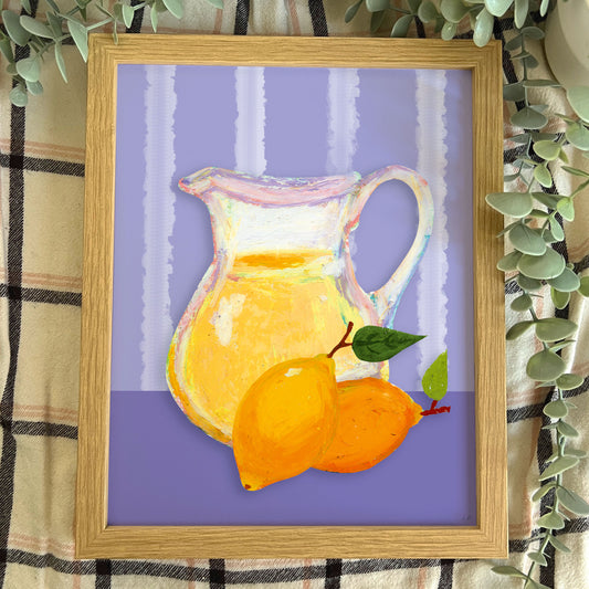 Framed artwork of a pitcher and lemons on a purple background