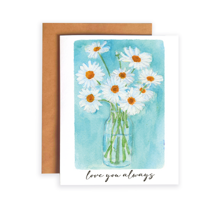 Greeting card with daisy flowers in a vase on a blue background
