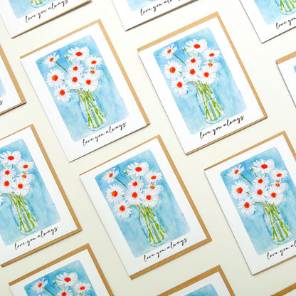 greeting cards with a vase of daisies illustration and text 'love you always'