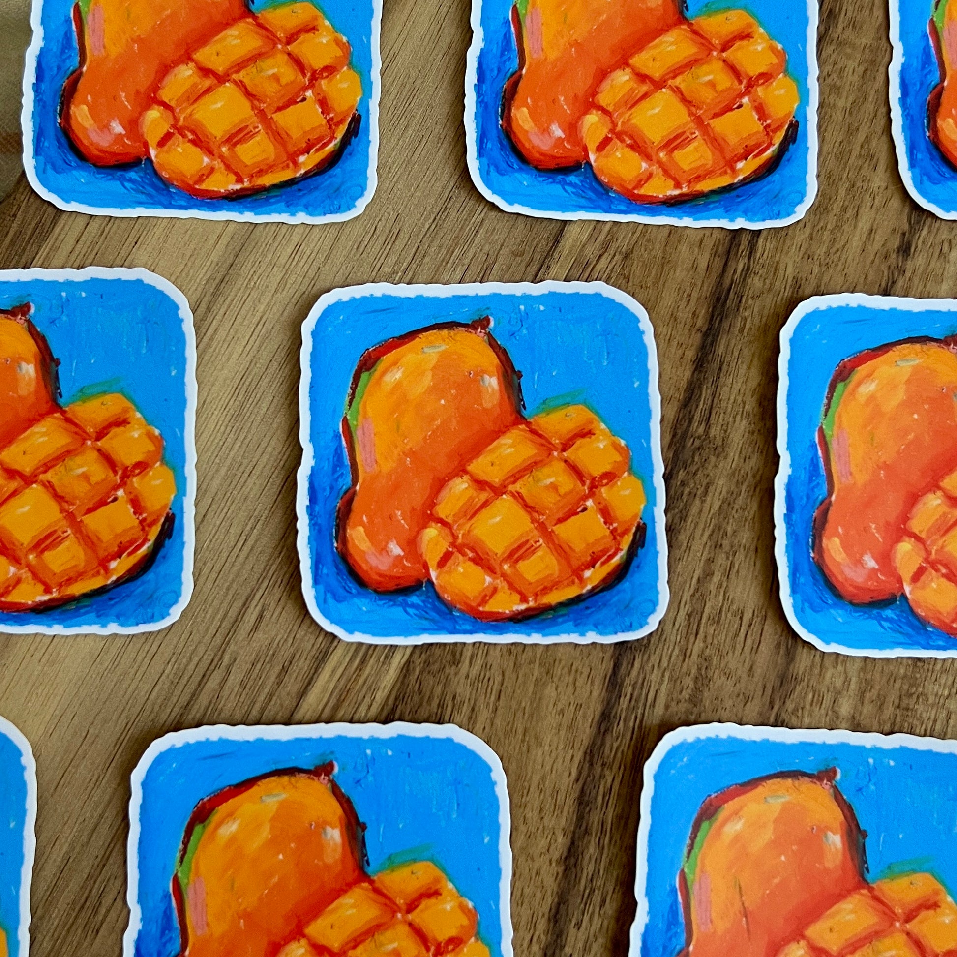 Pattern of mango illustrations on a wooden surface