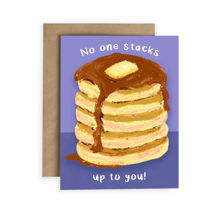 Greeting card with a stack of pancakes and maple syrup on a purple background with text 'No one stacks up to you!'