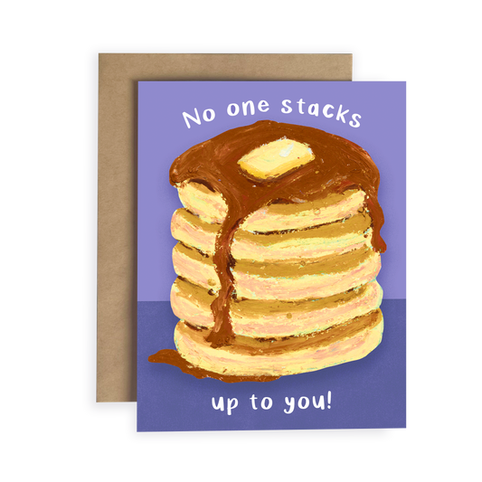 Greeting card with a stack of pancakes and maple syrup on a purple background with text 'No one stacks up to you!'