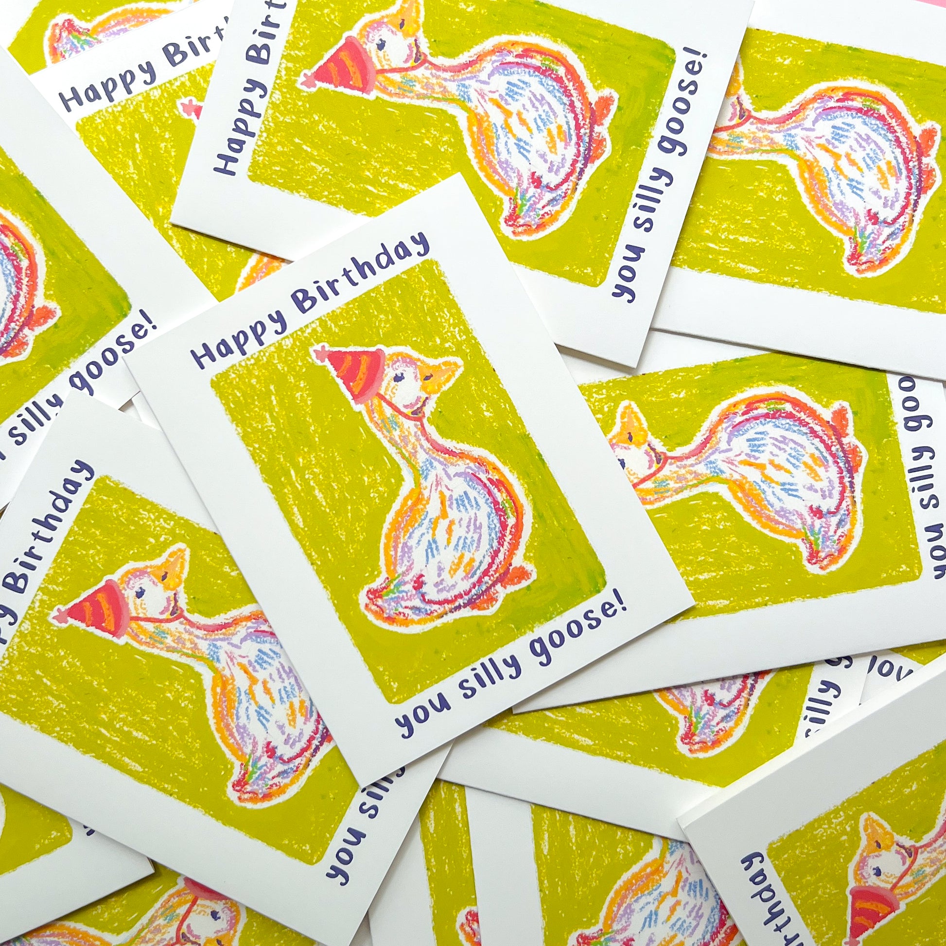 greeting cards with illustration of a goose in a party hat and text 'happy birthday you silly goose'