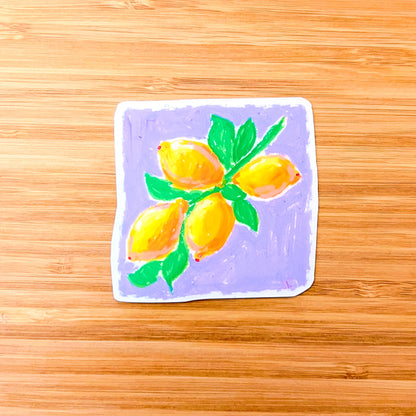 Sticker with a drawing of lemons on a wooden surface