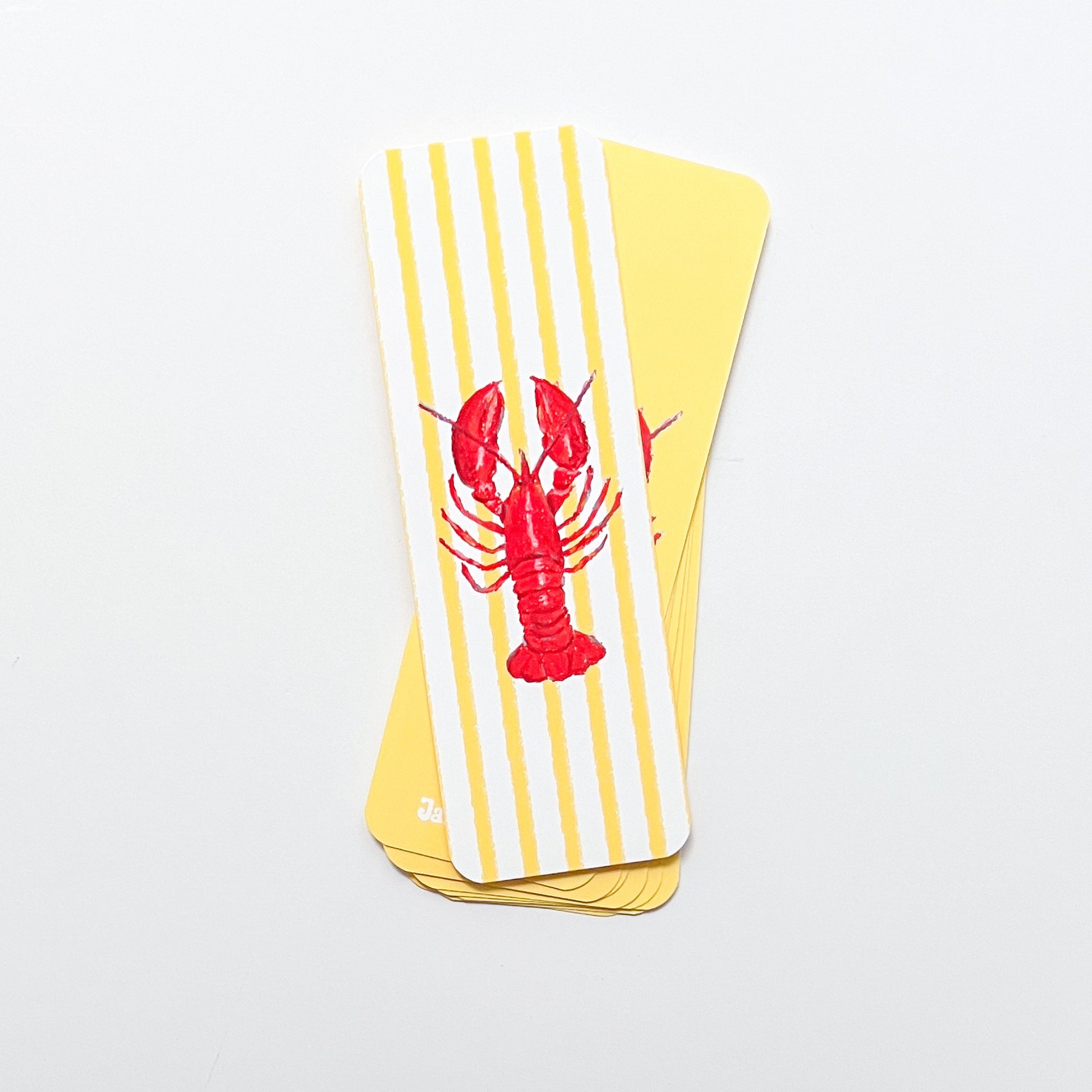 bookmarks with a red lobster design on yellow and white striped background