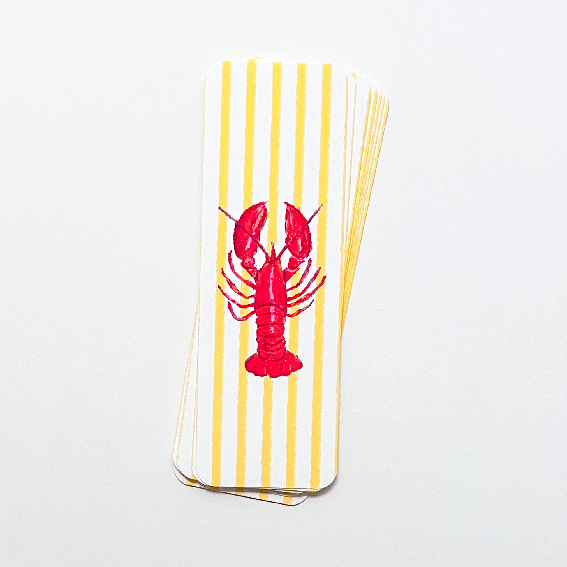 bookmarks with red lobster design on yellow and white striped background