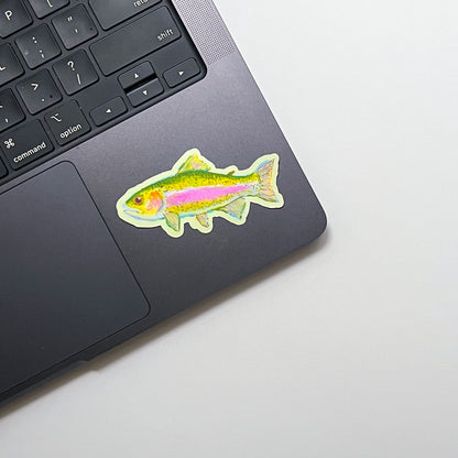 Fish-shaped sticker on a laptop keyboard