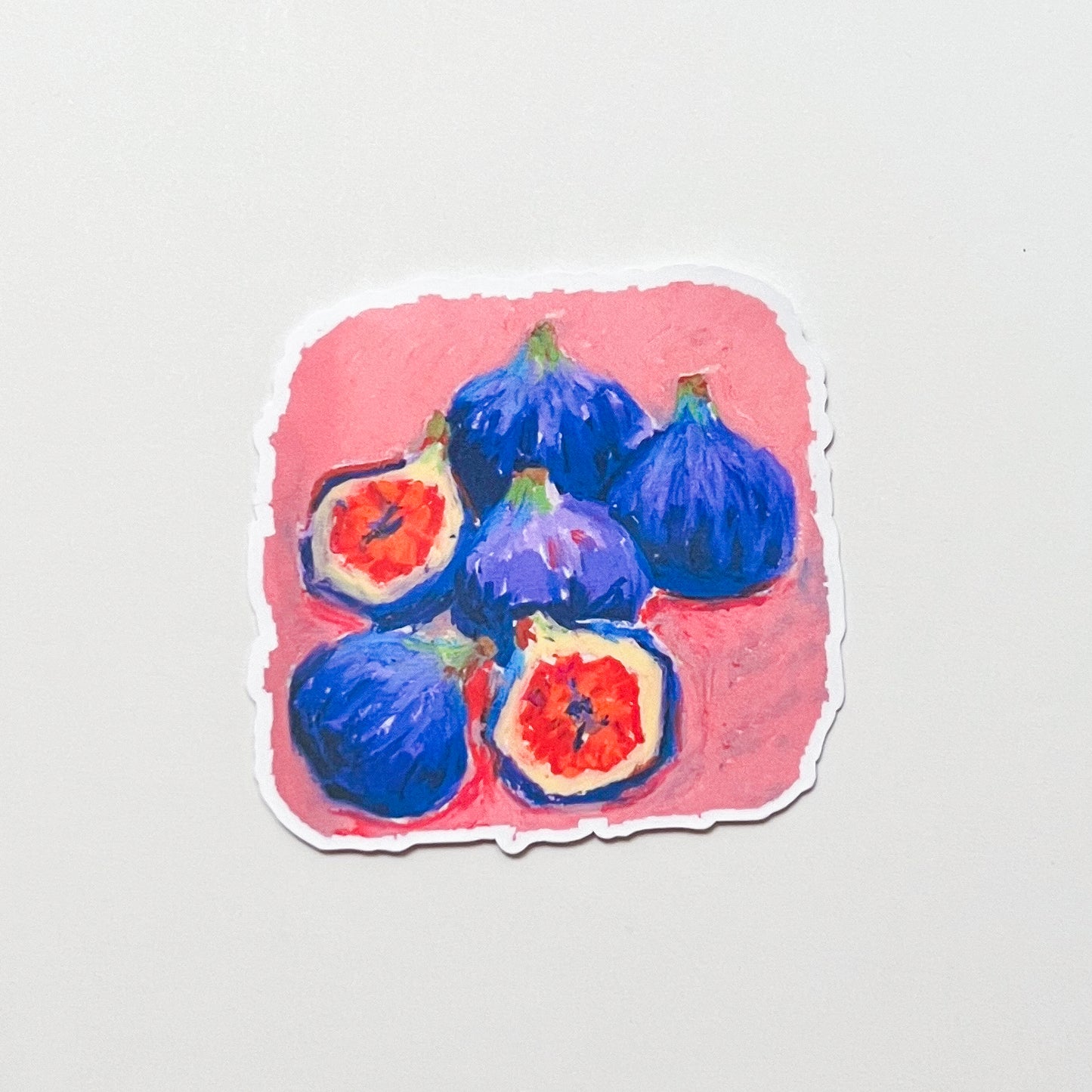 Artistic depiction of figs on a pink background