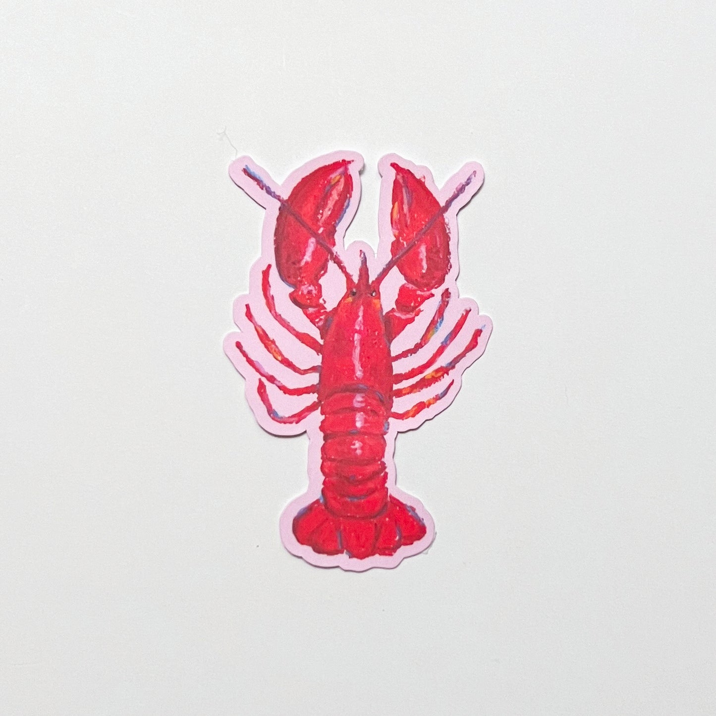 Red lobster sticker on a light gray background