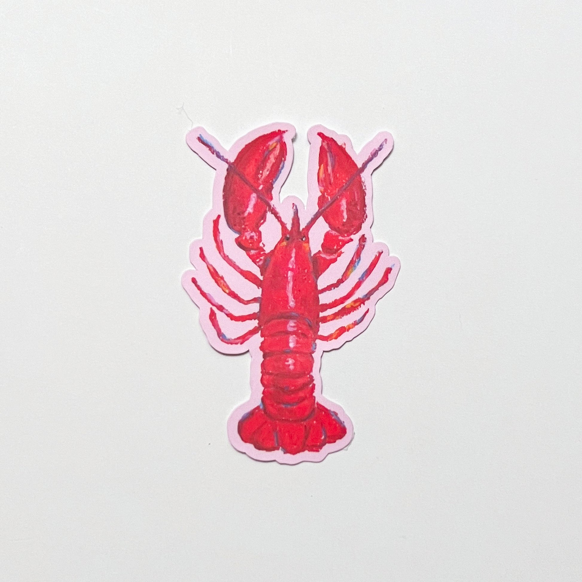 Red lobster sticker on a light gray background