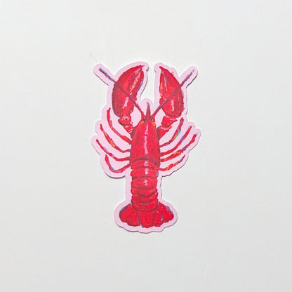 Red lobster sticker on a light gray background