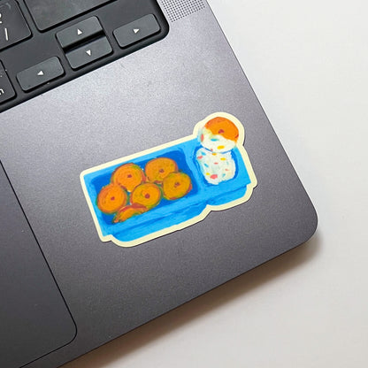 Sticker of dunkaroos on a laptop