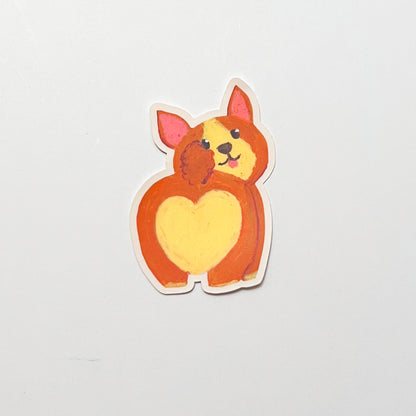 Sticker of a cartoon dog with a heart-shaped body on a light gray background