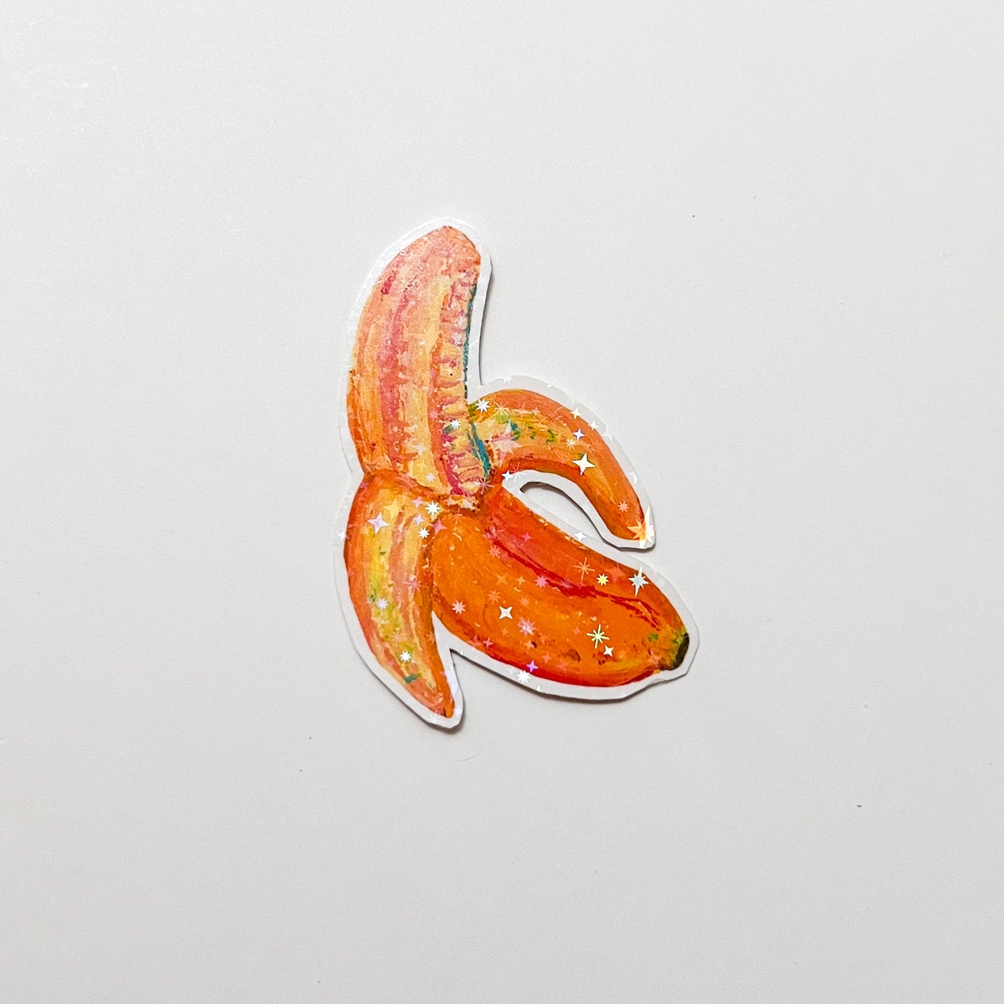Decorative banana sticker on a light gray background