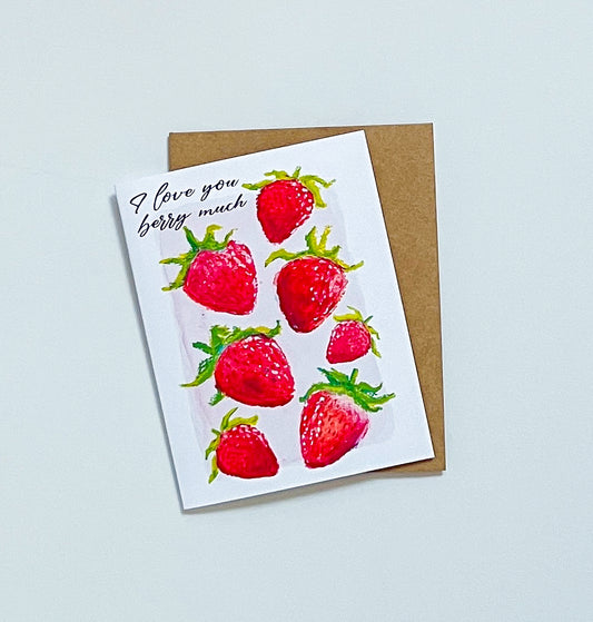 Greeting card with strawberry illustrations and text on a light blue background