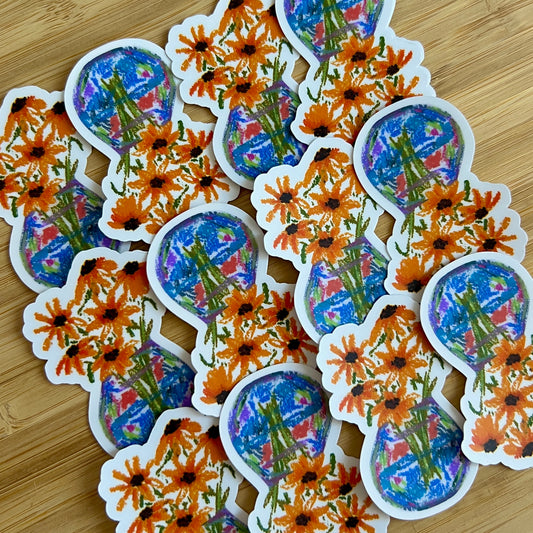 Stickers with floral designs on a wooden surface