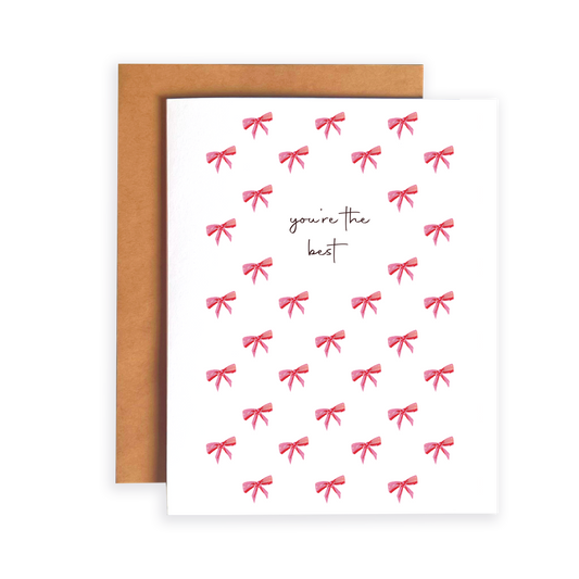 Greeting card with red bows and 'you're the best' text on a white background